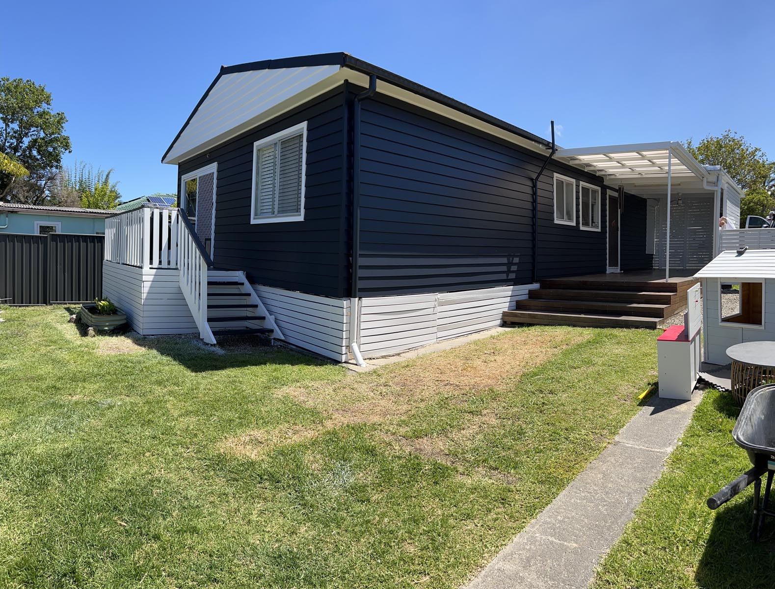 Exterior weatherboard home with fresh paint and clean lines