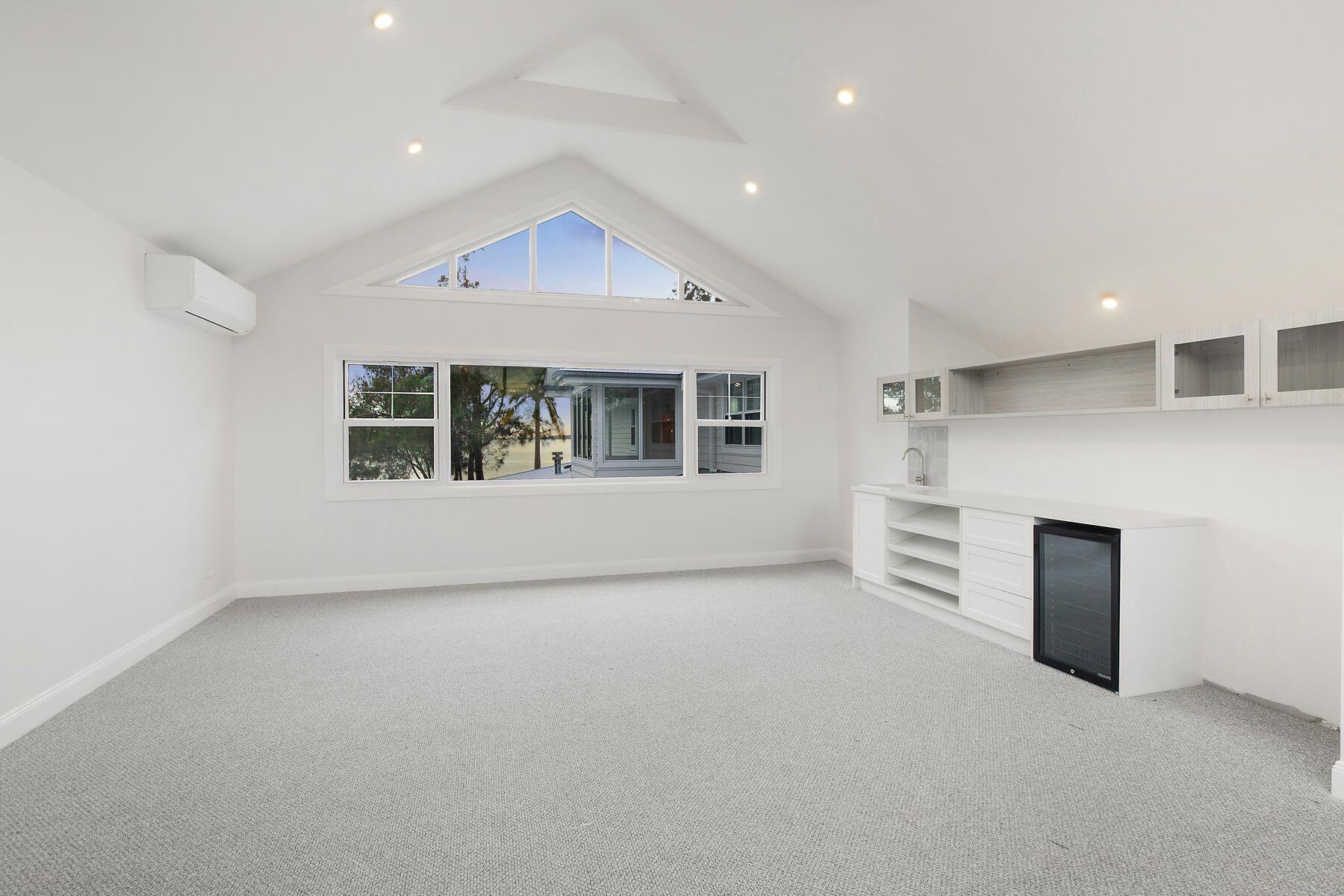 Interior repaint of a coastal-style bedroom in Lake Macquarie