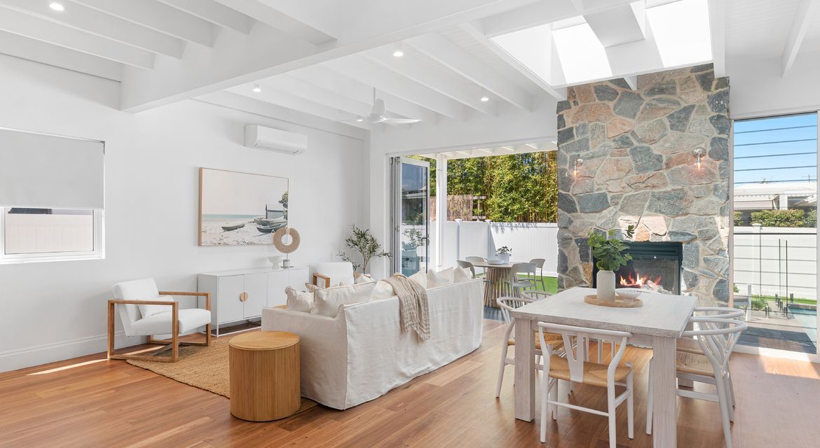 Open-plan dining area with freshly painted neutral tones