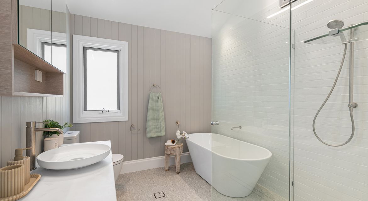 Bathroom with moisture-resistant painted walls in soft beige