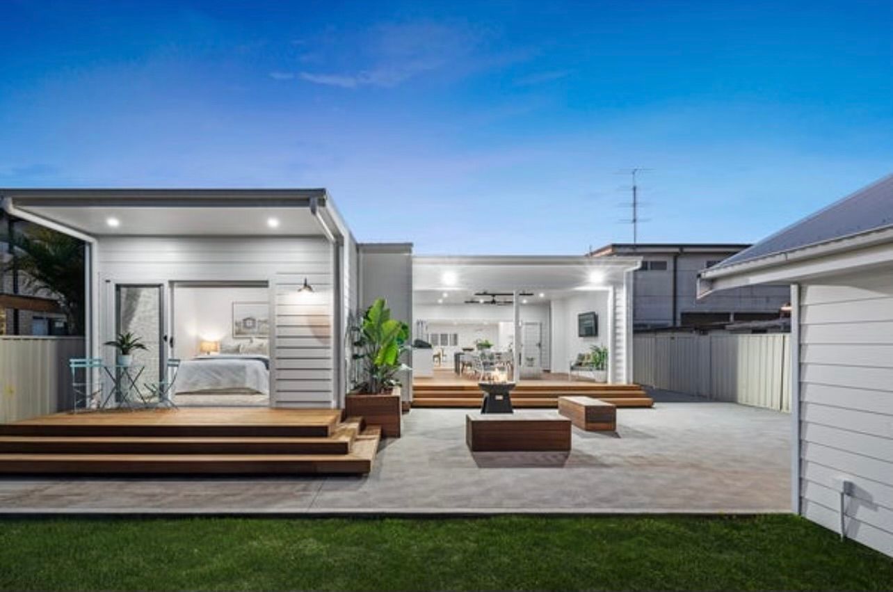 Exterior weatherboard home with fresh paint and clean lines