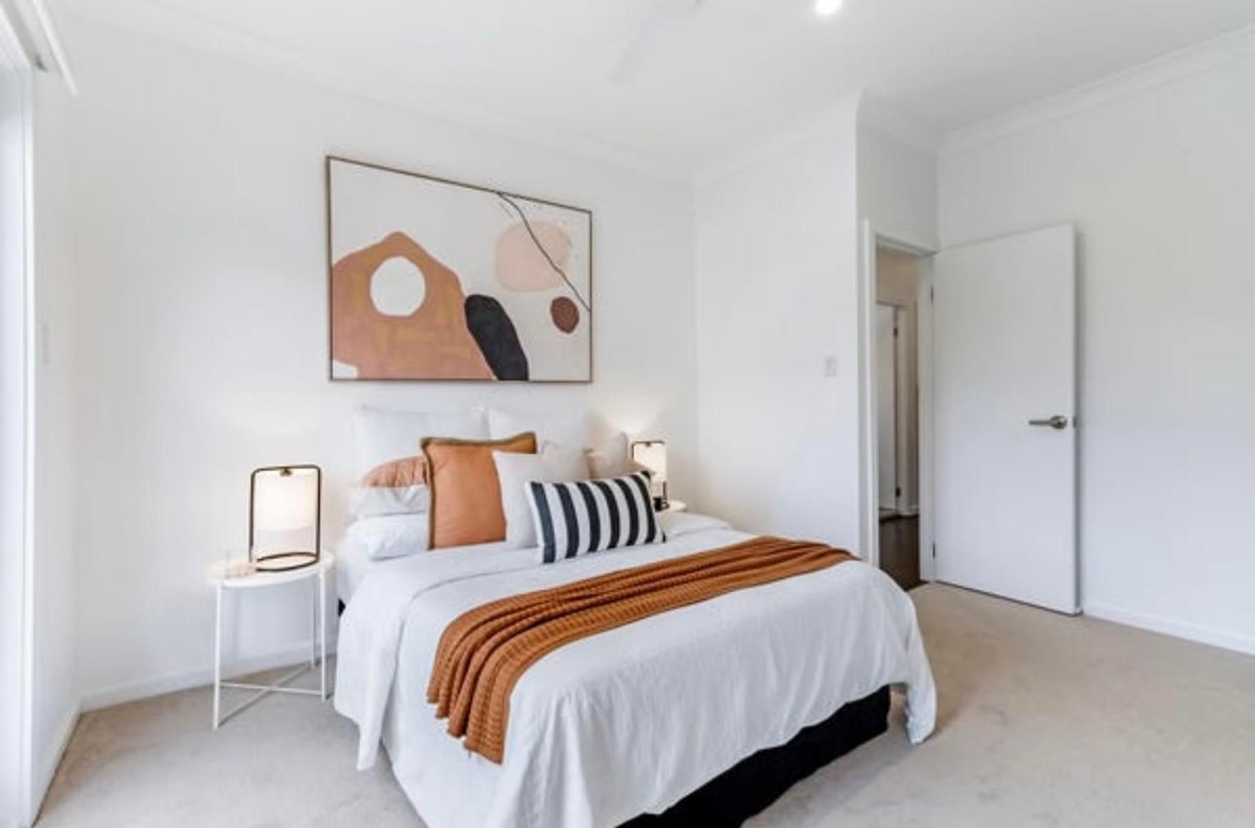 Interior repaint of a coastal-style bedroom in Lake Macquarie