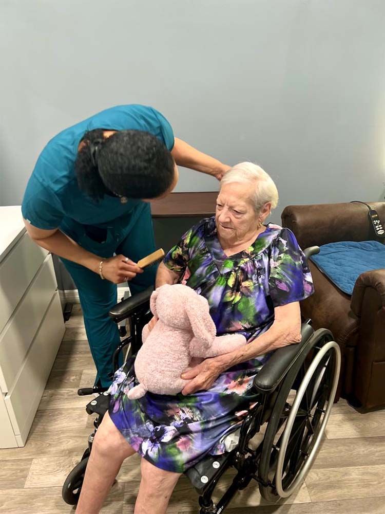 Home Care Aide Talking to Her Patient