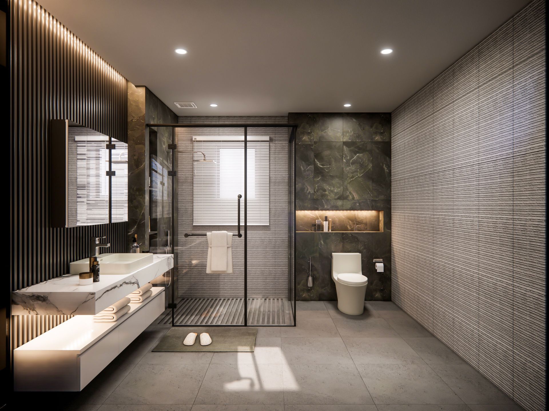 A bathroom with a toilet , sink , mirror and walk in shower.