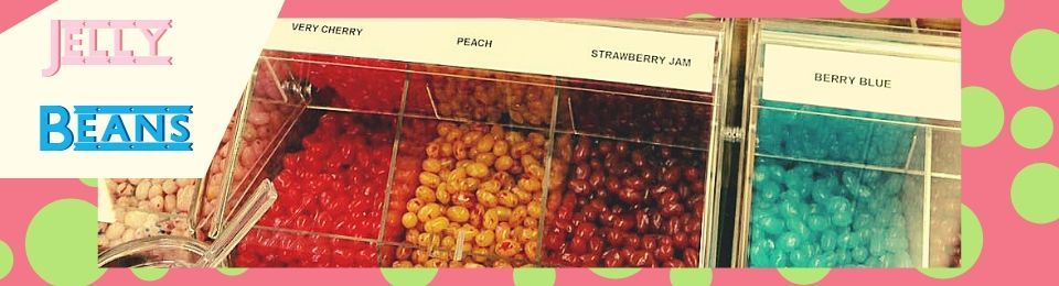 Jelly Beans candy display with bins of red, yellow, and blue beans in a colorful shop
