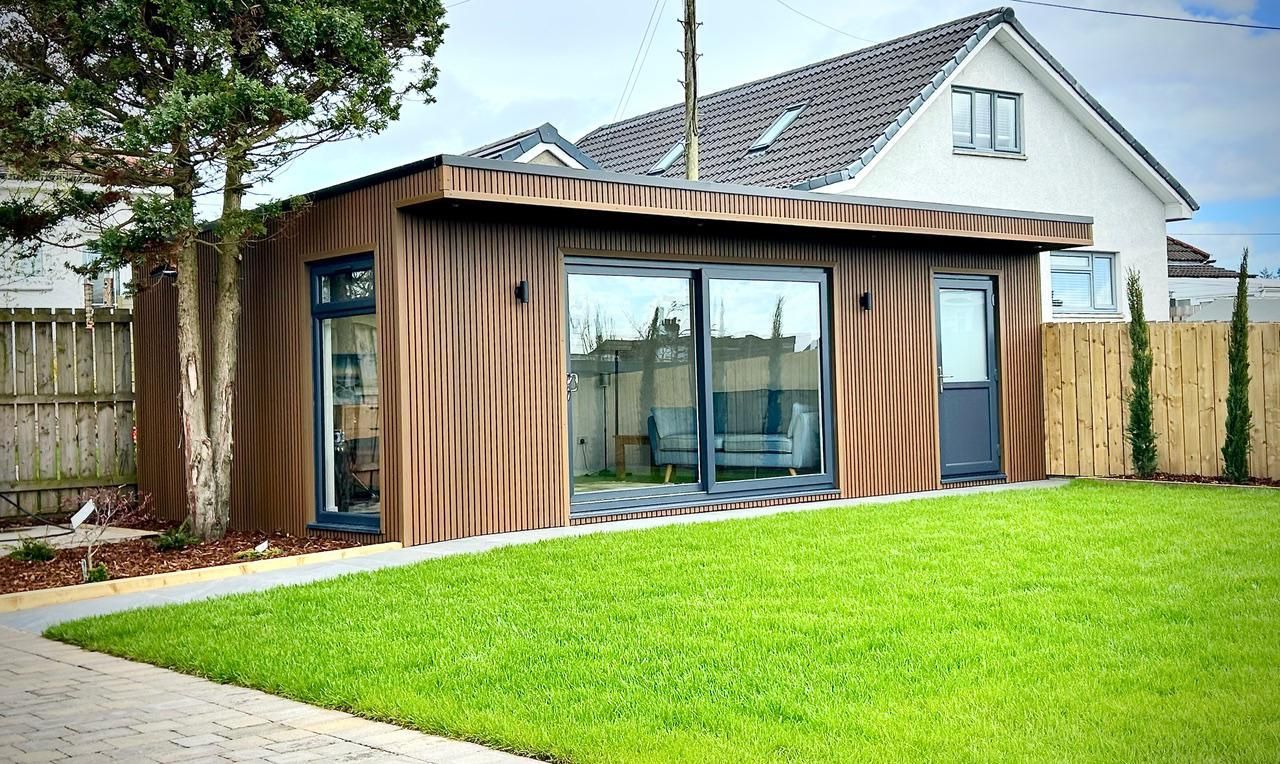 Oakspan garden room with integrated shed and storage space