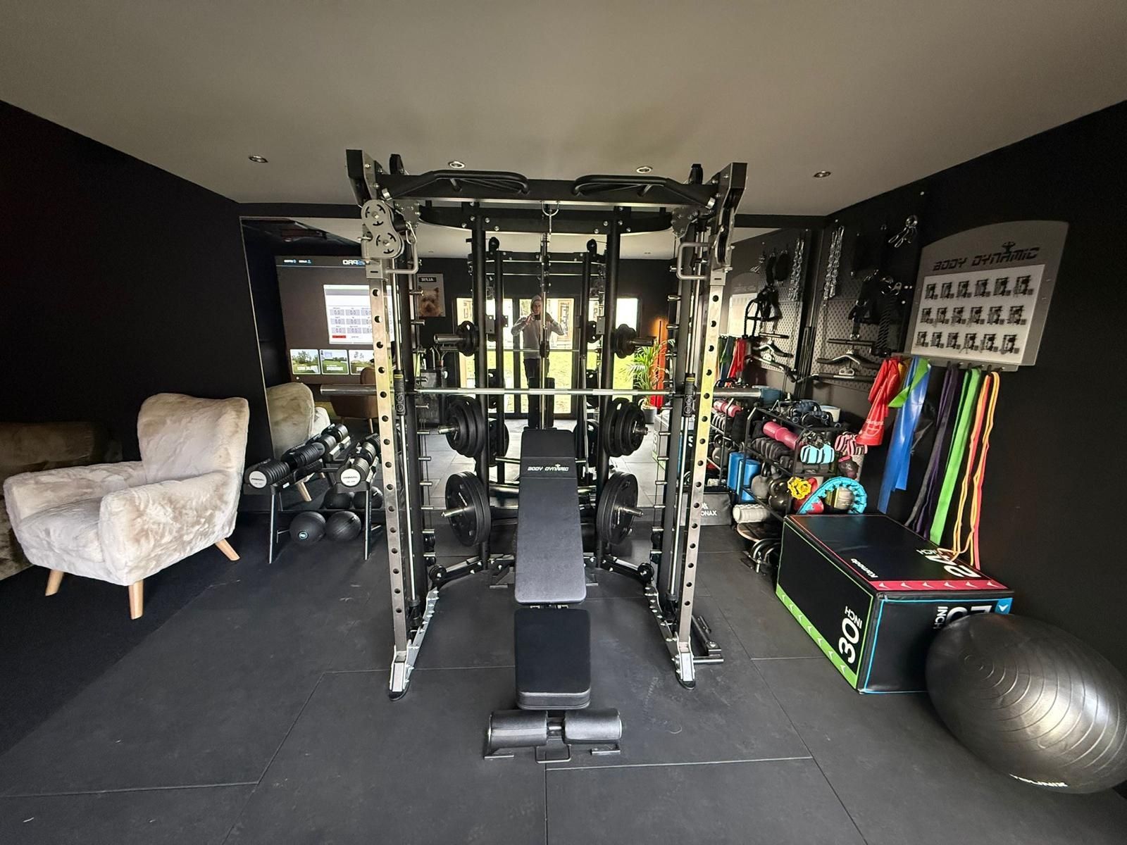 Dark Premium Bespoke Garden Gym Dark premium bespoke garden gym with squat rack, mirrors, storage, rubber flooring and strength training equipment