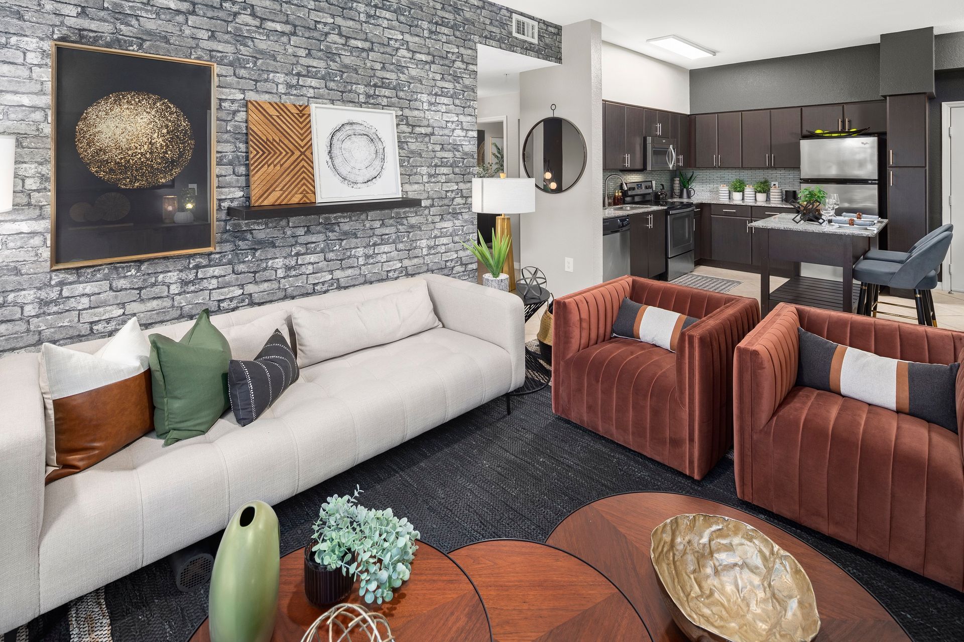 Apartment living room and open kitchen at Mosaic at Miramar Town Center.