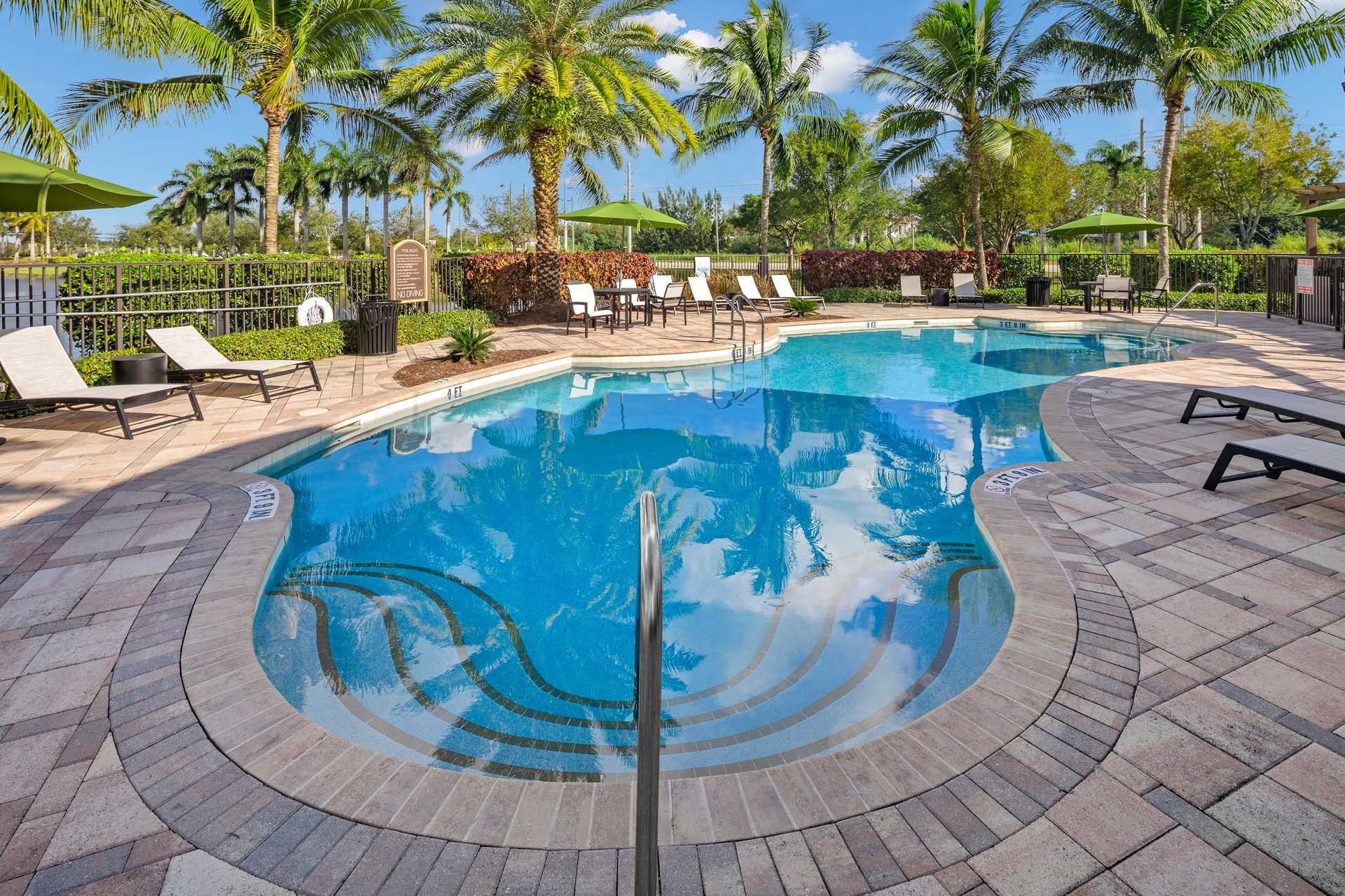 Beautiful outdoor swimming pool in Florida at Mosaic at Miramar Town Center.