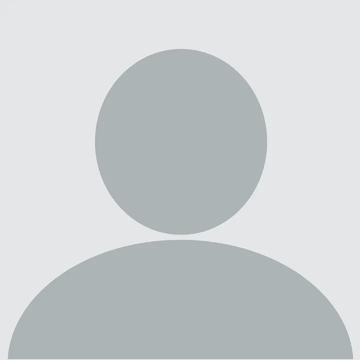 Silhouette of a person, head and shoulders, in gray on a gray background.