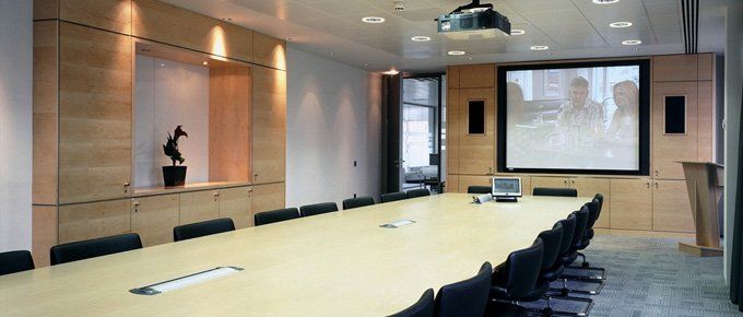 Boardroom with projector, available from Marrick Commercial Interiors for Basingstoke, Woking and surrond