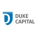 The logo for duke capital is a blue shield with a letter d on it.