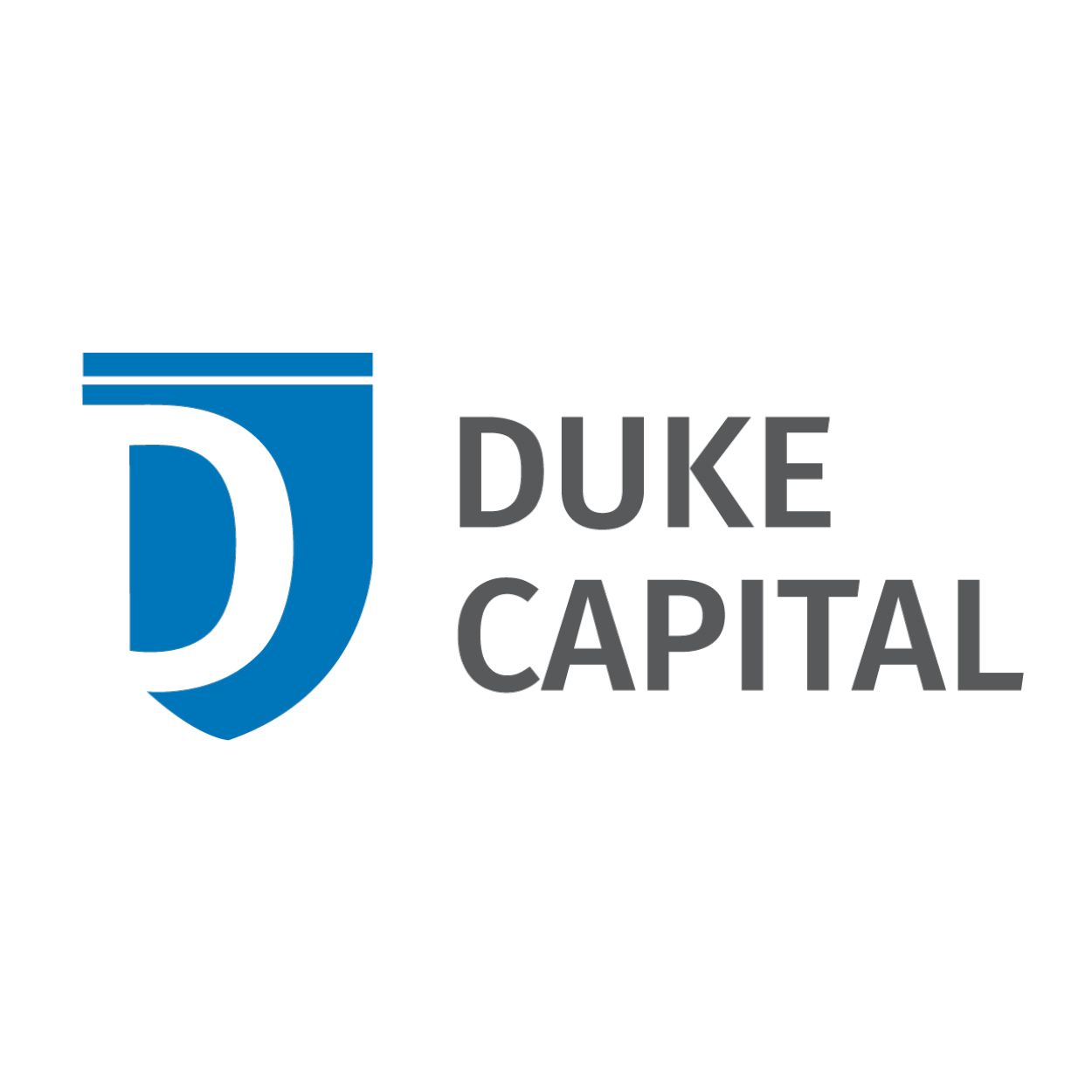 The logo for duke capital is a blue shield with a letter d on it.