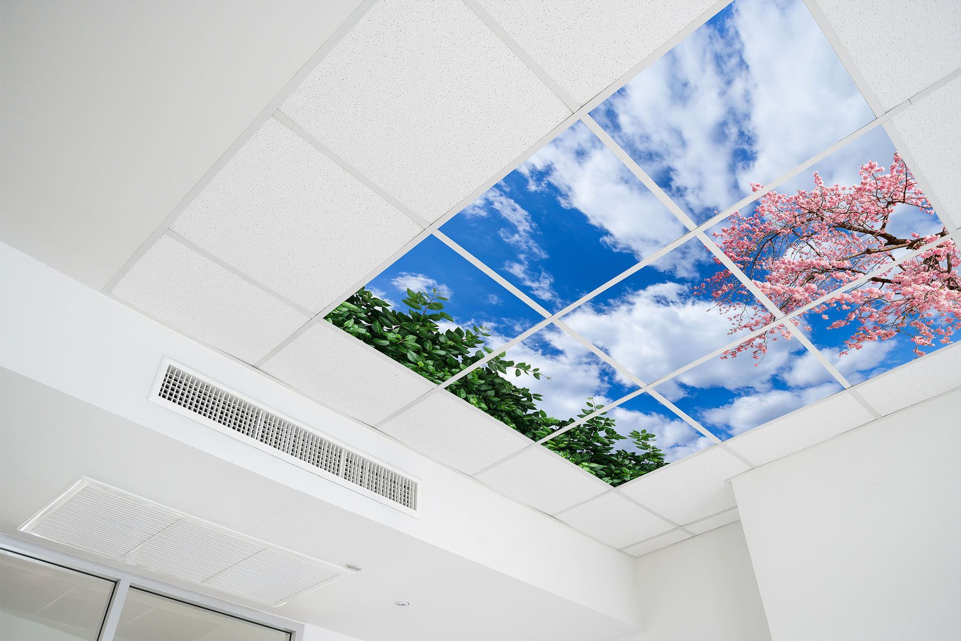 LED sky ceiling panels in modern office workspace