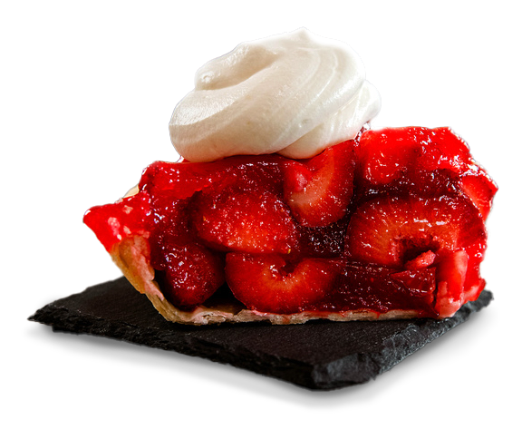 A slice of strawberry pie with whipped cream on top