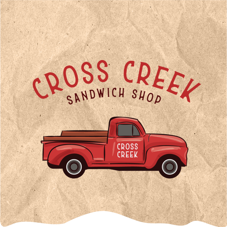 The logo for cross creek sandwich shop shows a red truck