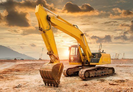 Construction ─ Yellow Backhoe in Lubbock, Tx