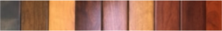 Vertical wooden planks in warm brown, tan, and purple tones close together.