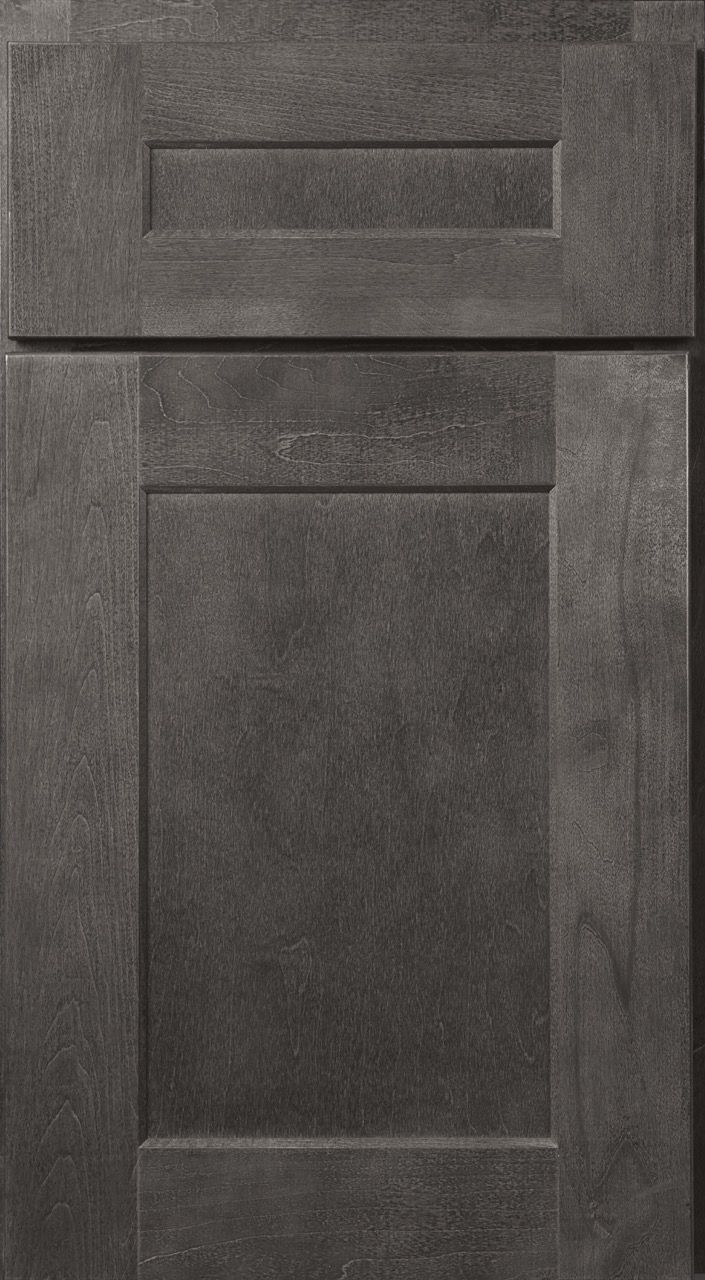 Dark gray cabinet door with a single drawer at the top.