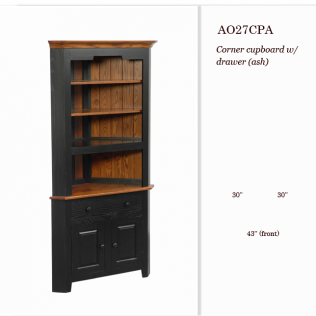 Black corner cabinet with shelves and lower doors, accented with warm wood trim.
