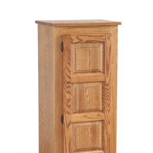 Oak wooden cabinet with three paneled doors and a flat top, shown on a white background