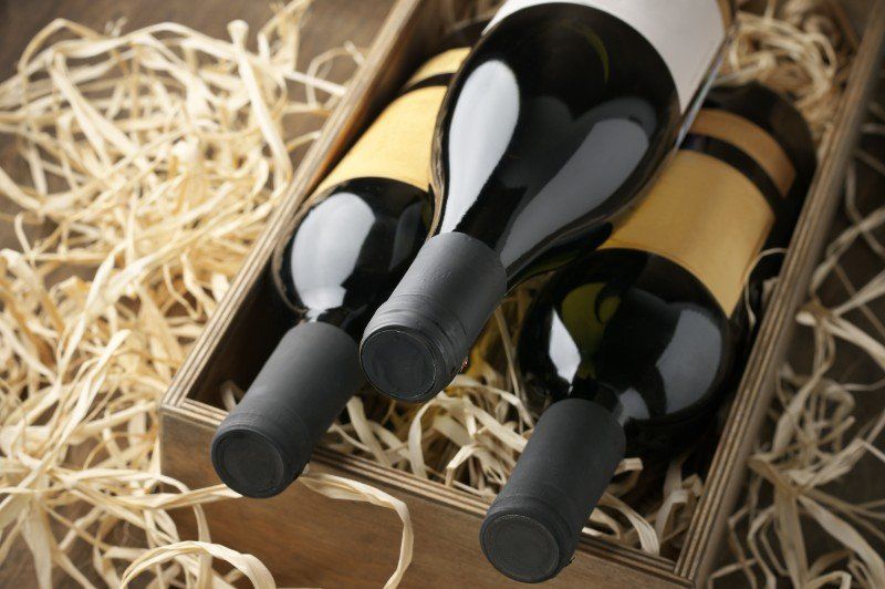 wine bottle in a wooden box