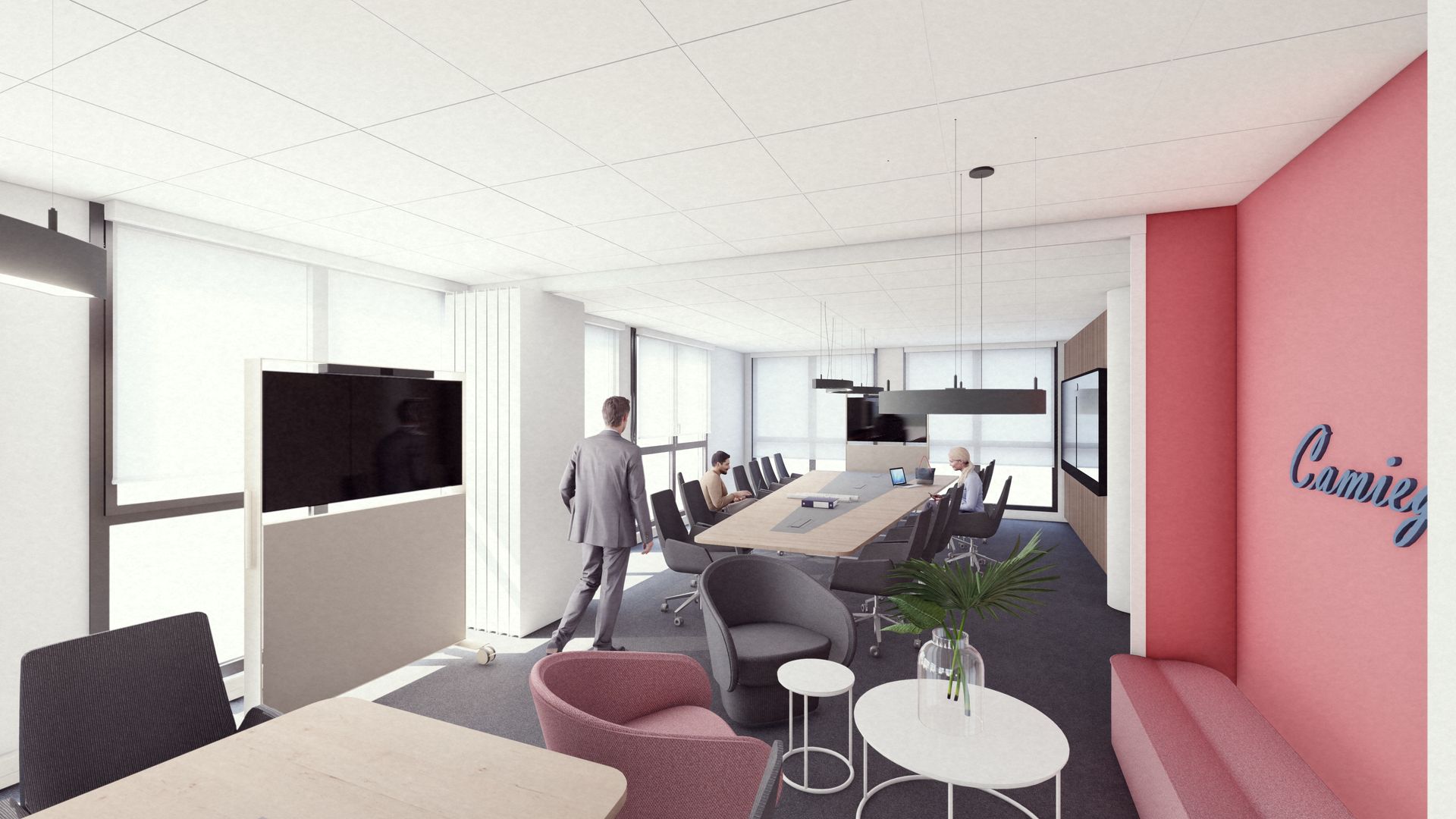 Une buanderie ou une salle de classe textile comprenant plusieurs tables à repasser recouvertes de housses bleues et des rangées de chaises et de tables.