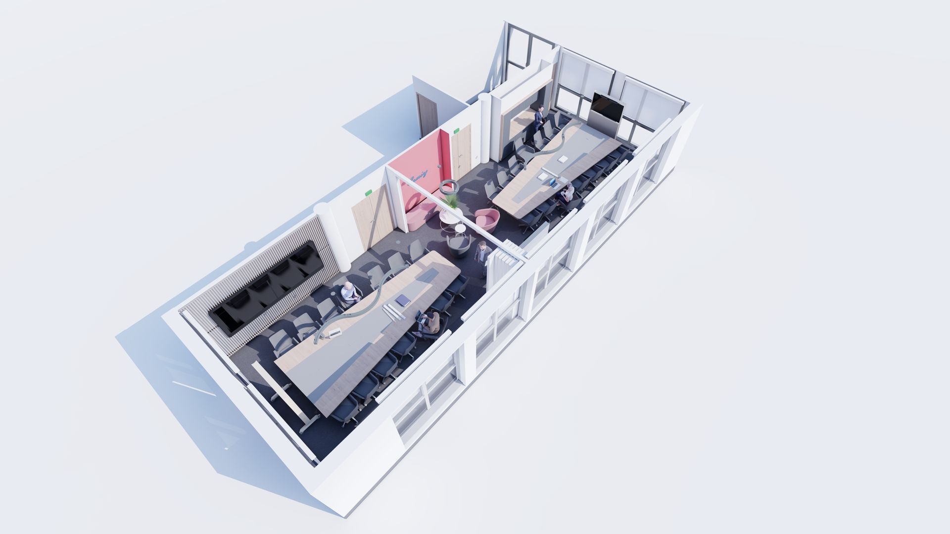 Une salle de classe avec plusieurs tables bleues réglables de type médical, des chaises en bois, des bureaux et un rouleau de papier sur une table blanche.