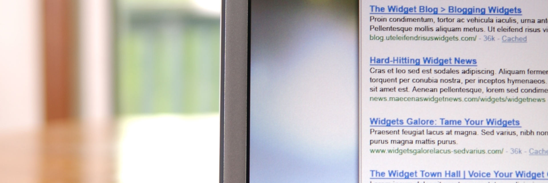 A close up of a computer screen with a blurred background