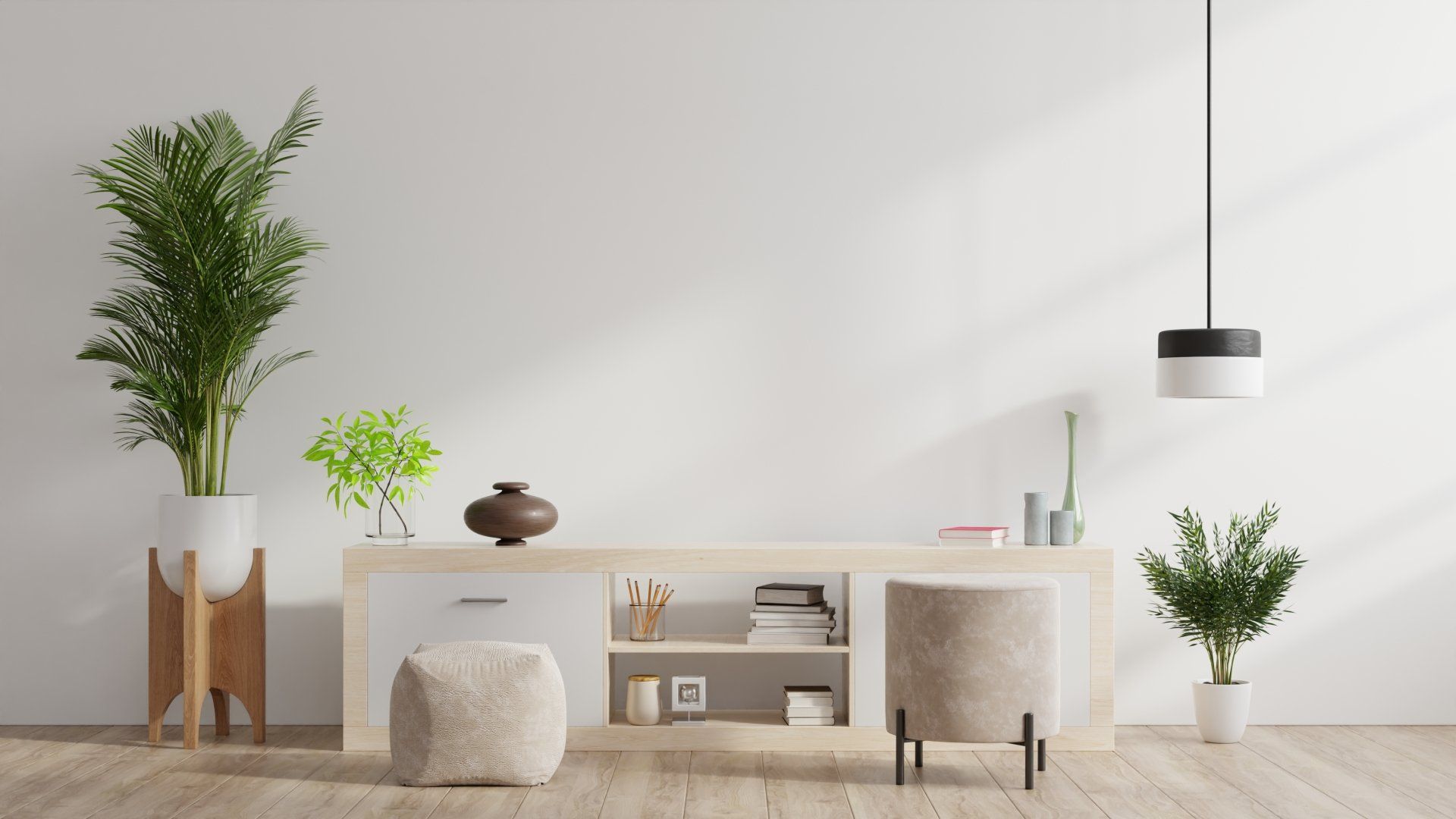 image of tan desk with three plants on the desk