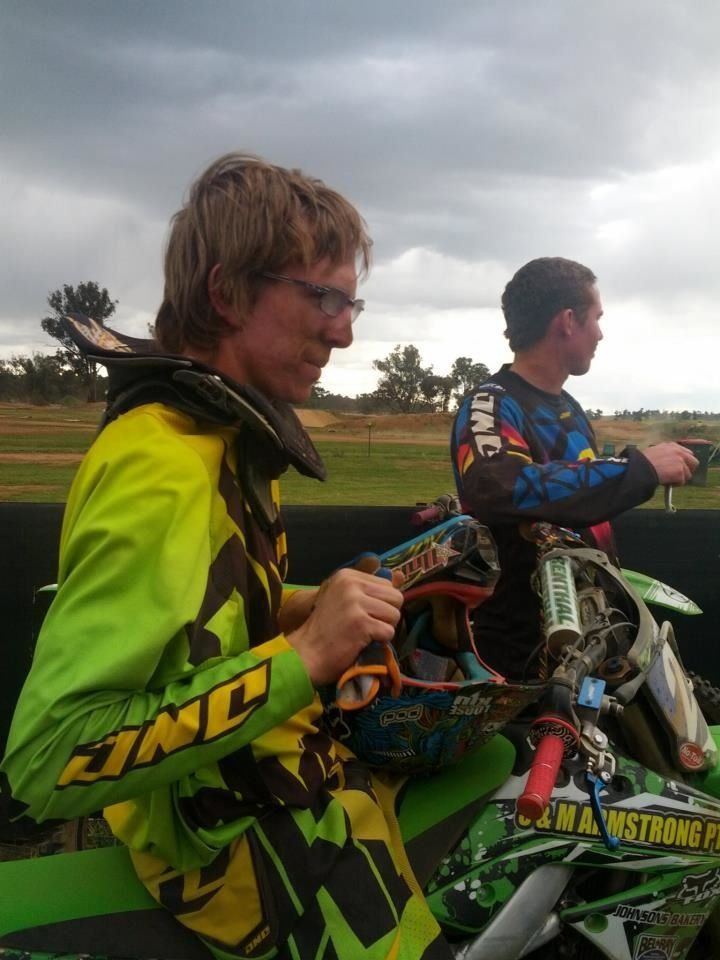 two racers wearing yellow green and blue