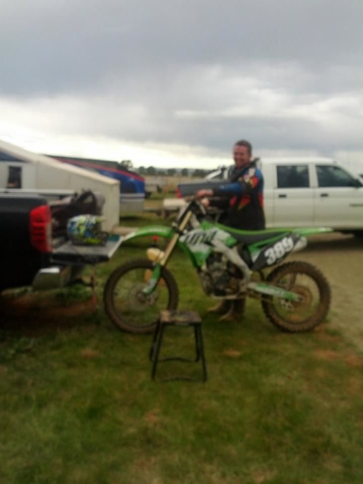 happy man sitting on his bike