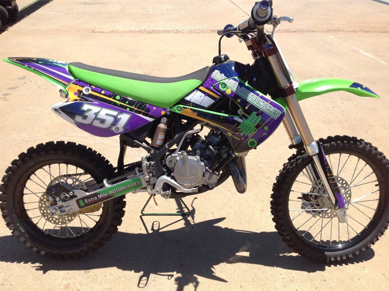 purplle and green bike