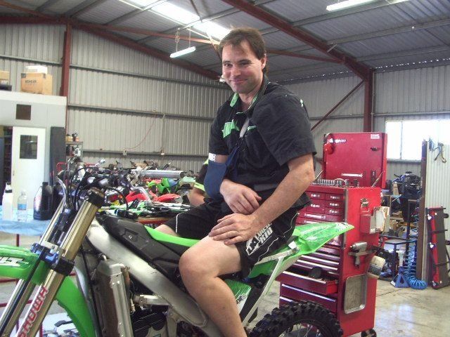 happy man sitting on his bike