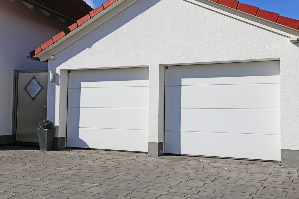 White Garage Doors With Red Roof Tiles
