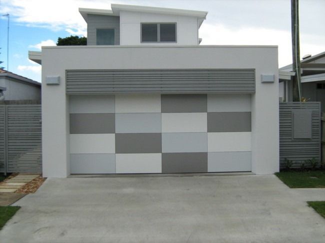 A White House With A Gray And White Garage Door — Gold Coast Door Centre In Burleigh Heads, QLD