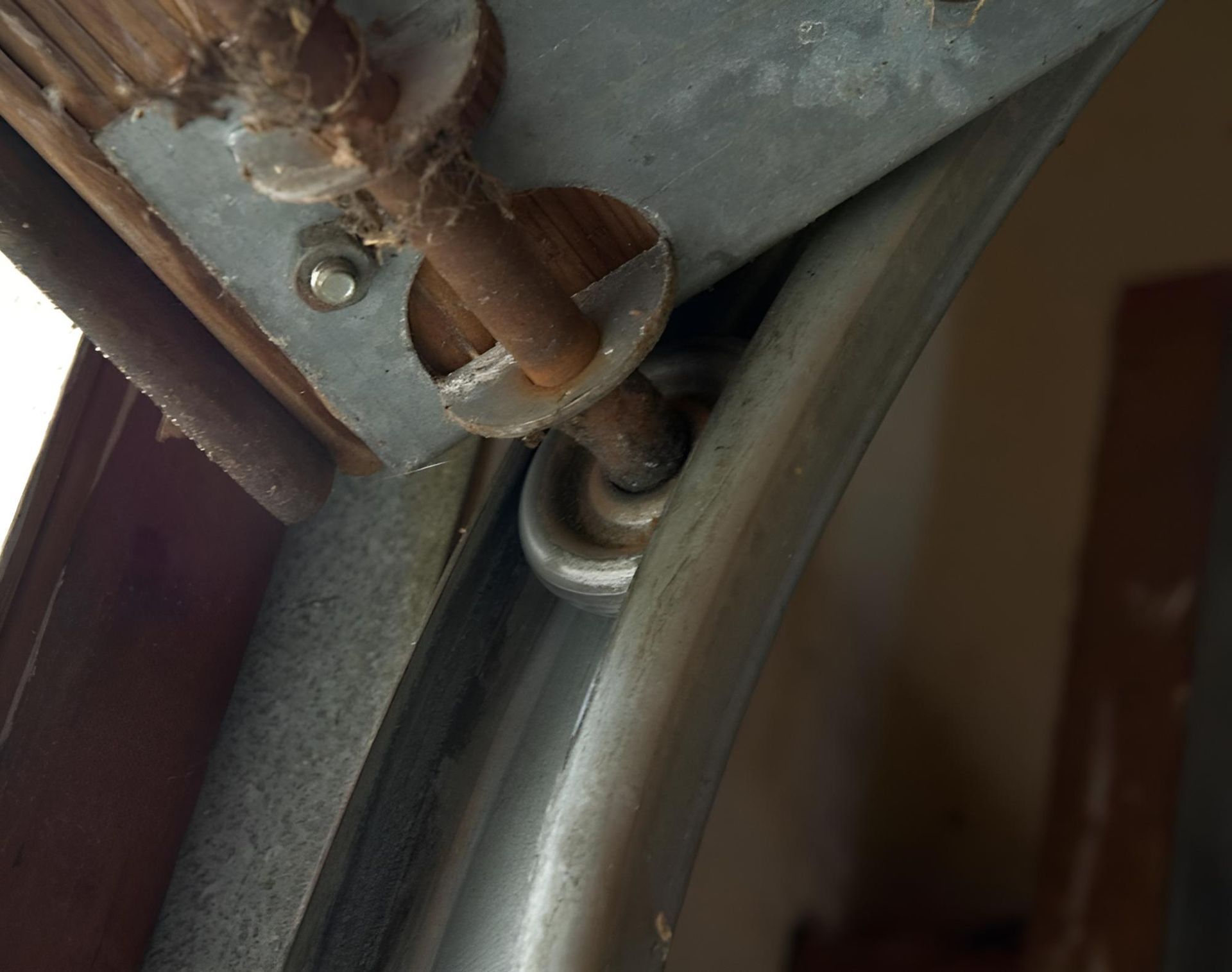A Close Up Of A Metal Pipe With A Screw In It — Gold Coast Door Centre In Burleigh Heads, QLD