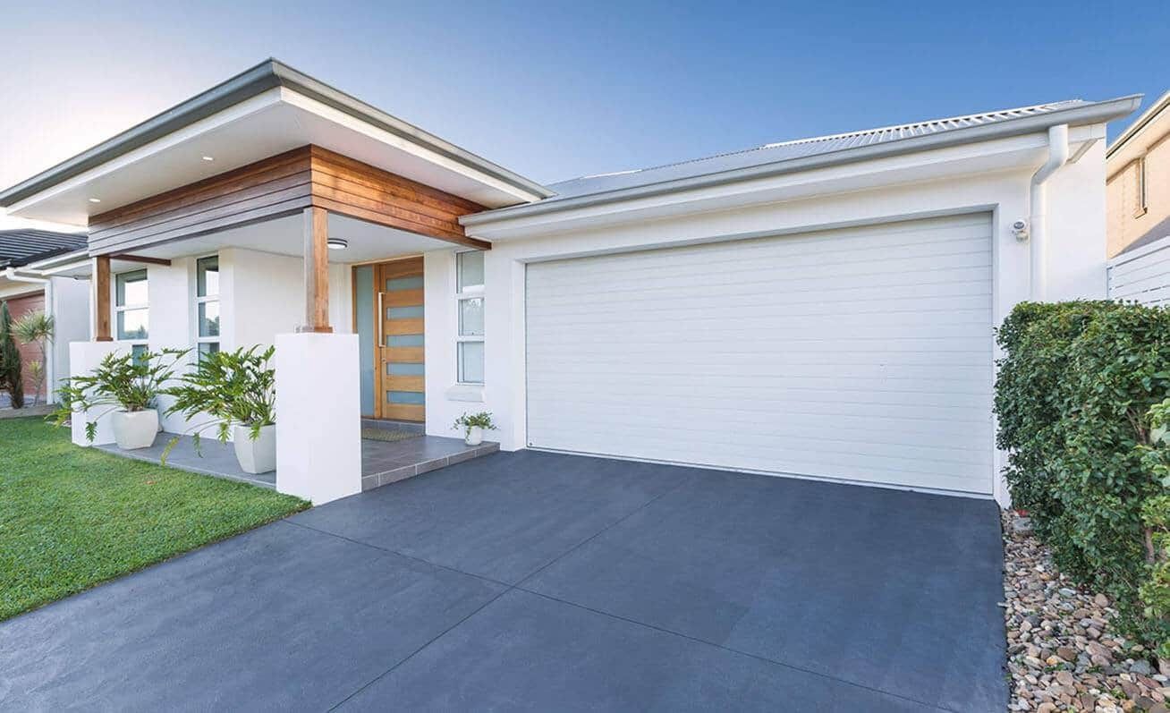 A White House And A White Garage Door — Gold Coast Door Centre In Burleigh Heads, QLD