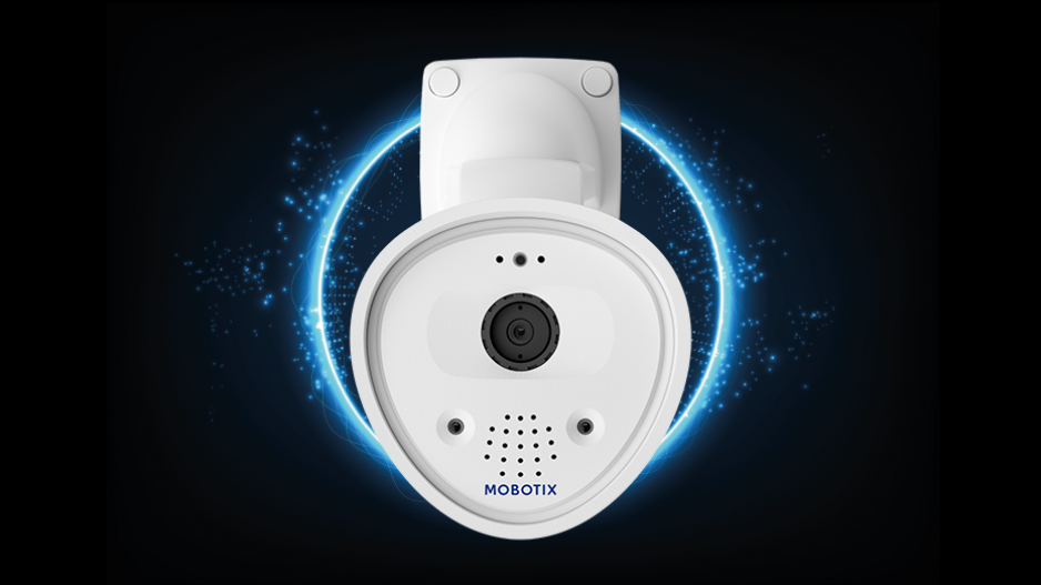 Ceiling-mounted security cameras and a monitor displaying multiple camera feeds, inside a room.