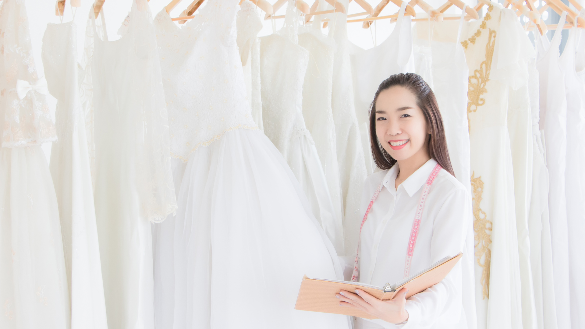 BridalLive inventory dashboard displaying wedding gown listings with style numbers, sizes, and designer names.