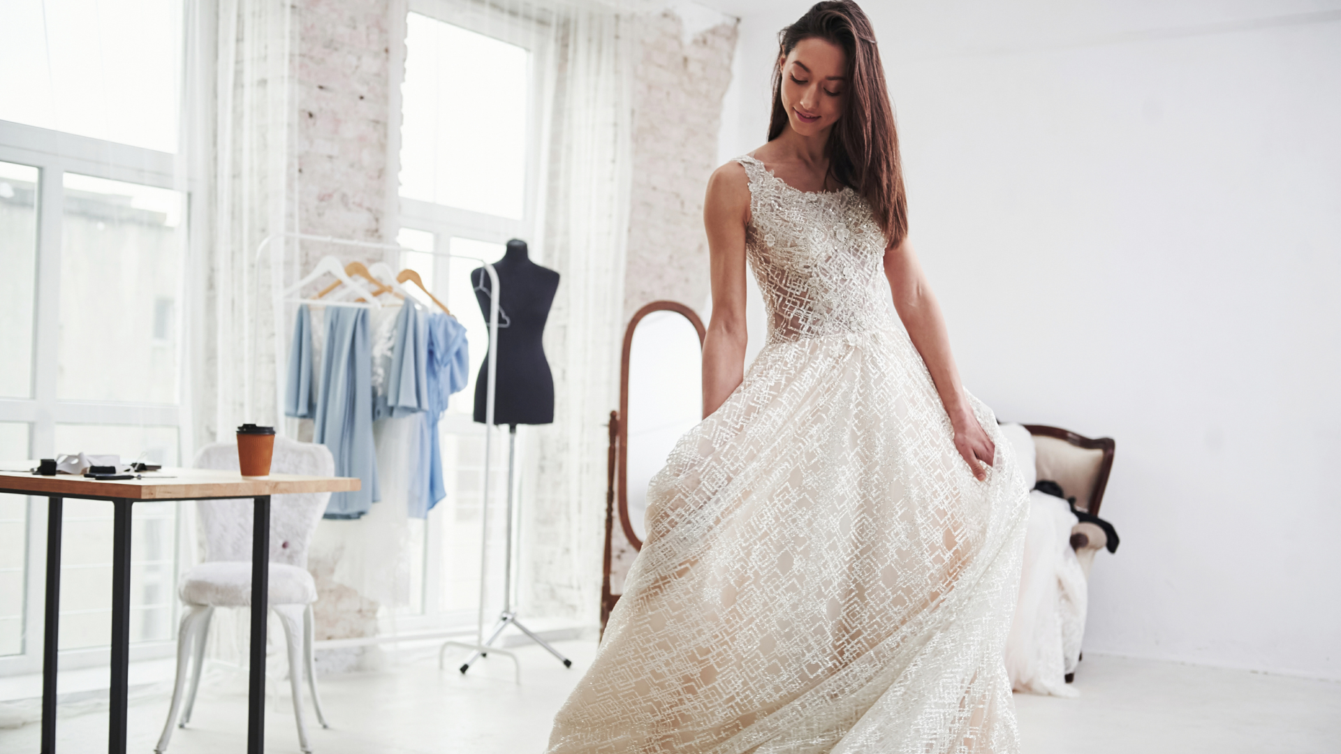 BridalLive inventory dashboard displaying wedding gown listings with style numbers, sizes, and designer names.