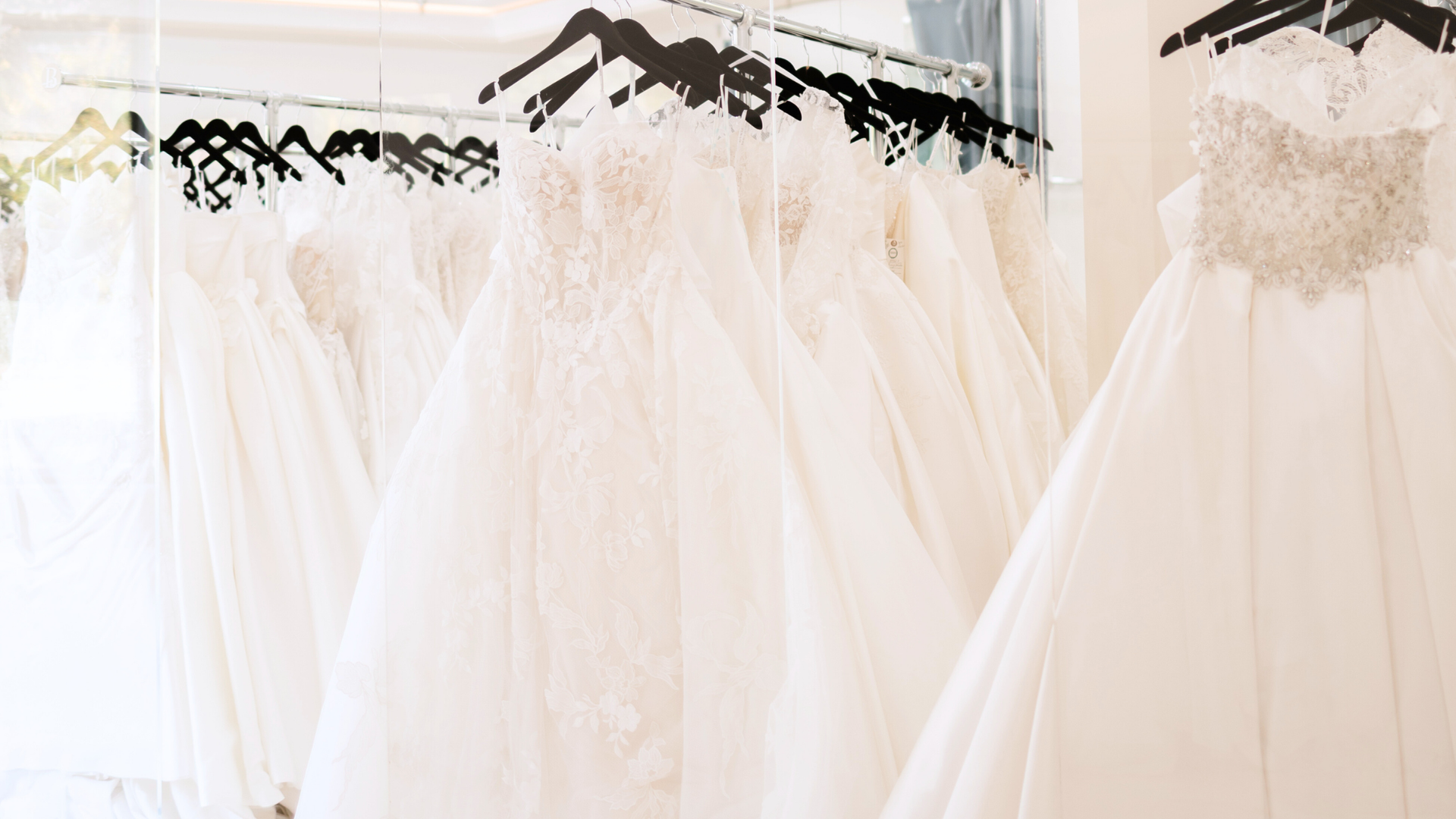 Bridal boutique owner setting sales goals using BridalLive software