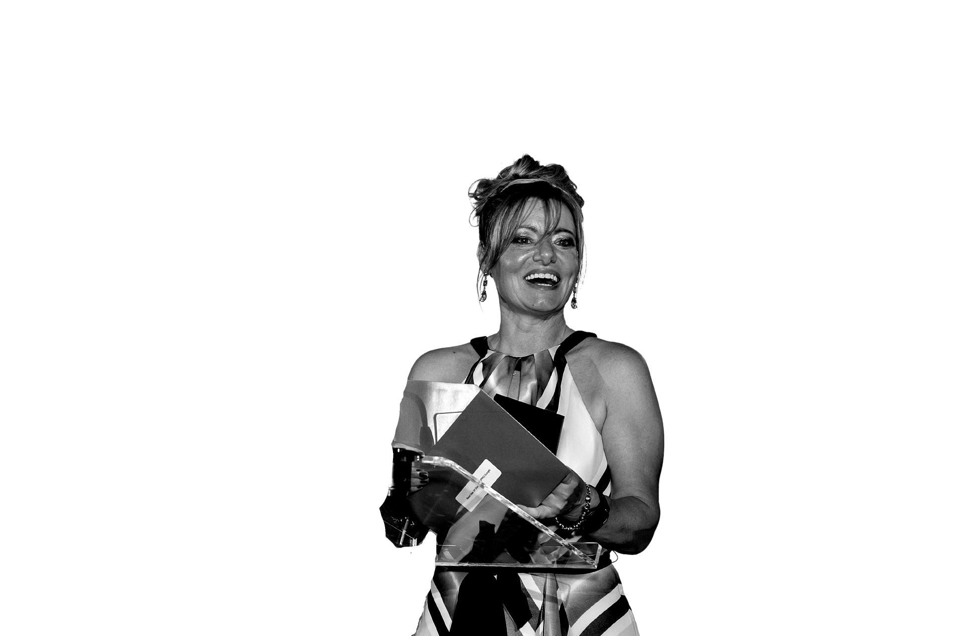 A man is holding a cat in his arms in a black and white photo