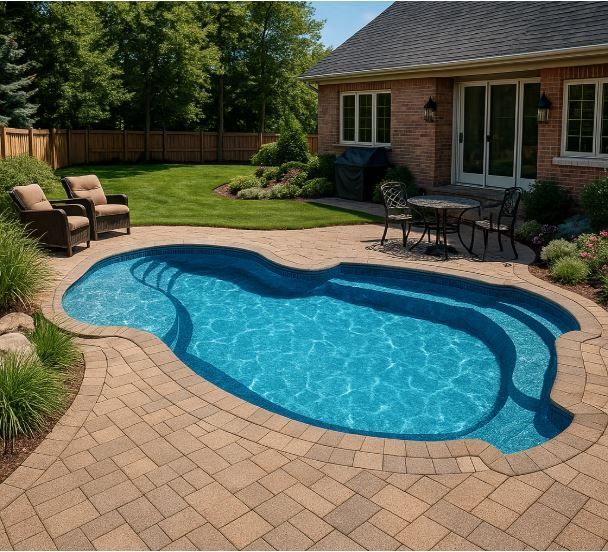 Backyard pool with brick patio, near a house. Includes lounge chairs, table, and garden.