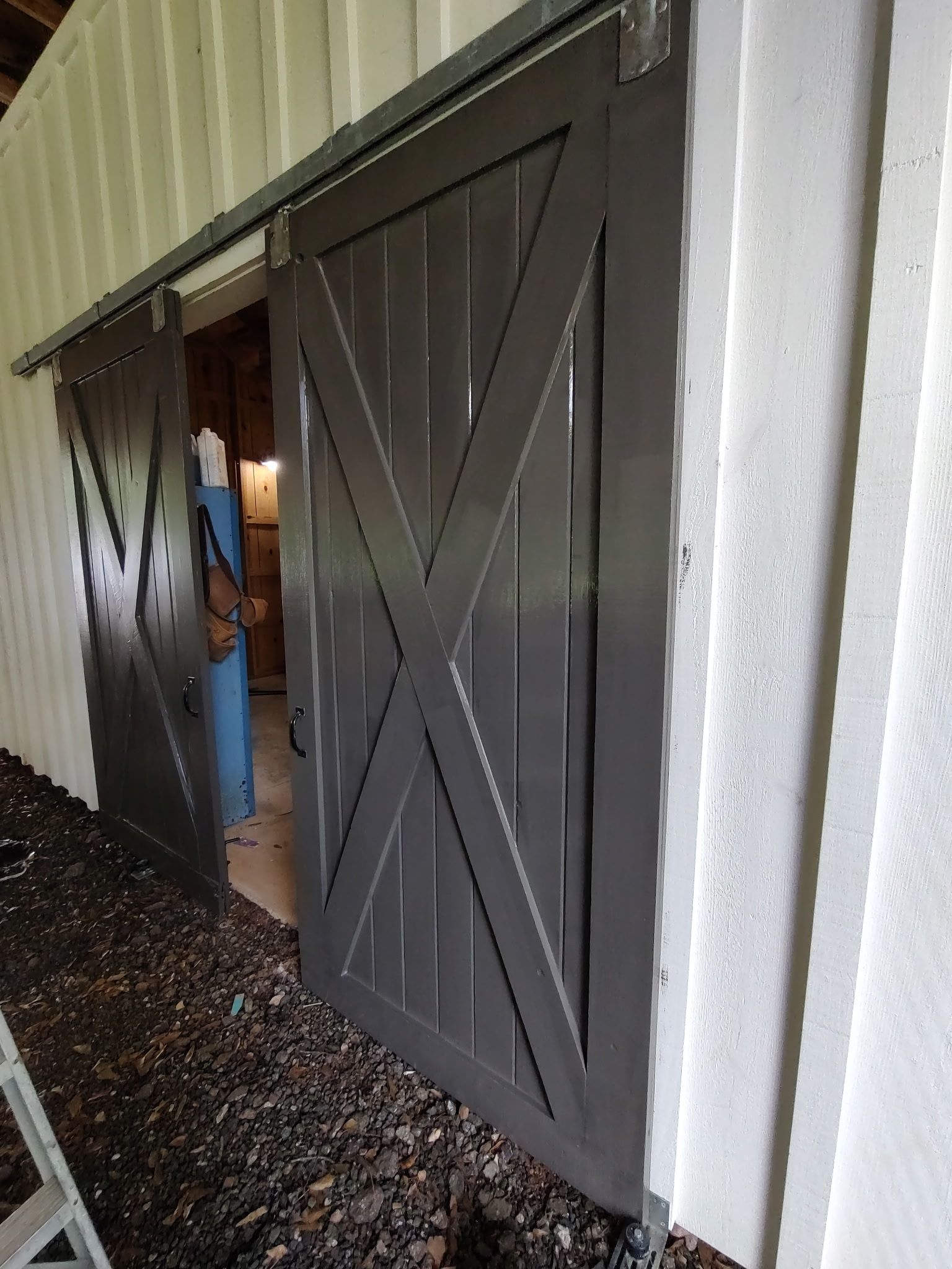 Dark gray barn doors with an