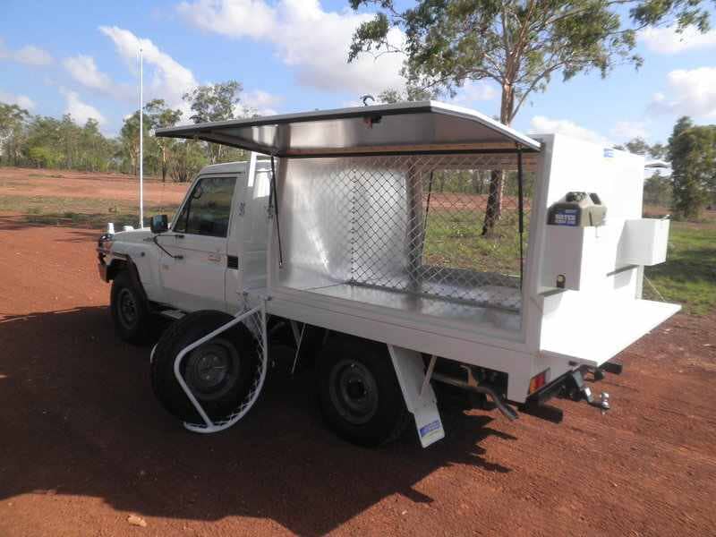 4x4 with tire carried beside them — Allycraft Modifications Aluminum Welding Fabrication Canopy in Winellie, NT