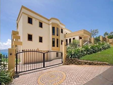 A Newly Painted Building With Big Windows — Marteene Painting Services In Kirwan, QLD