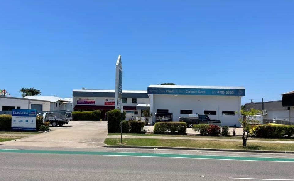 A Building With A Carpark Infront Of A Road — Marteene Painting Services In Kirwan, QLD