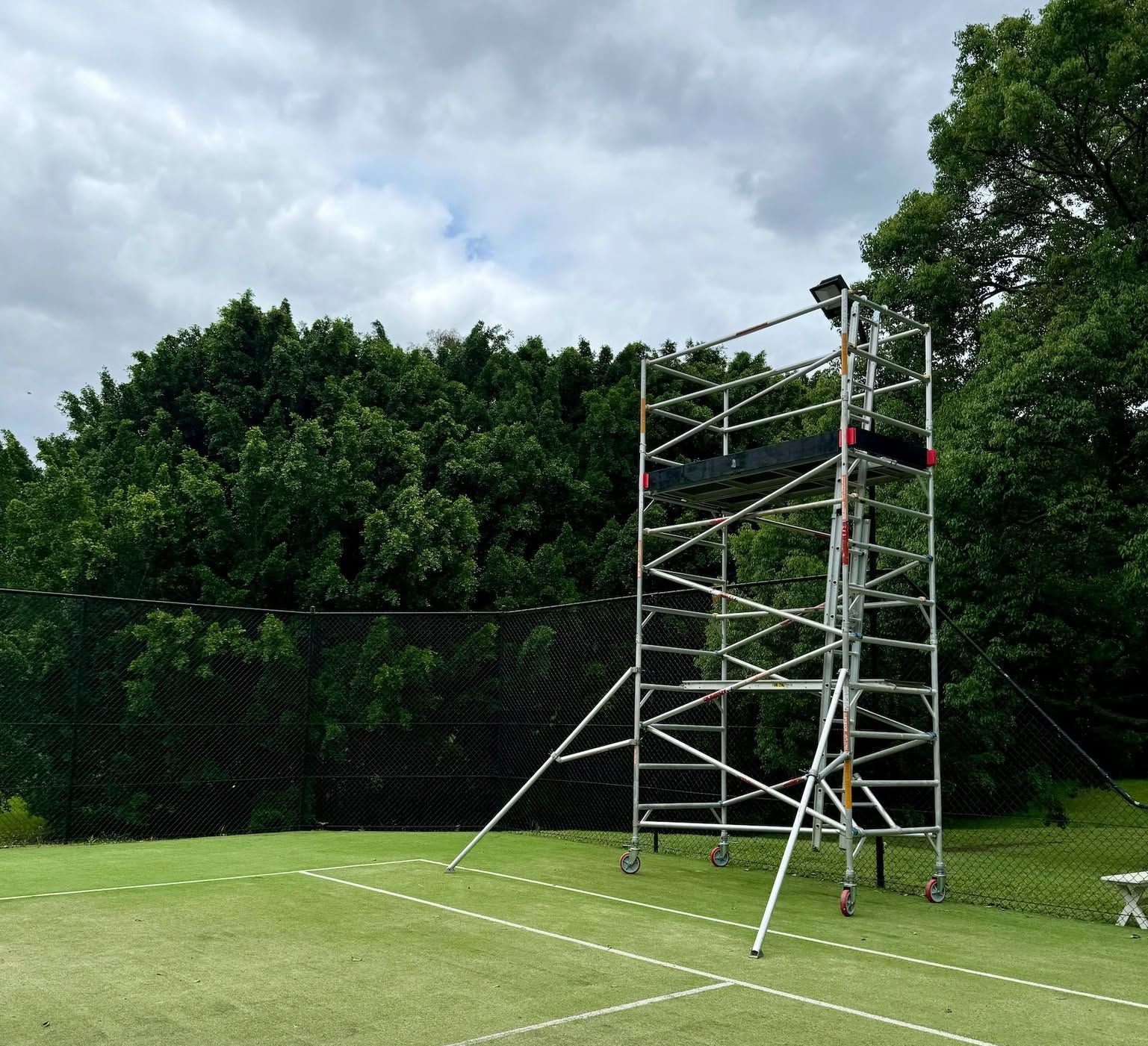 Scaffolding with Equipment on A Tennis Court — Superior Access Hire in Wynnum, QLD