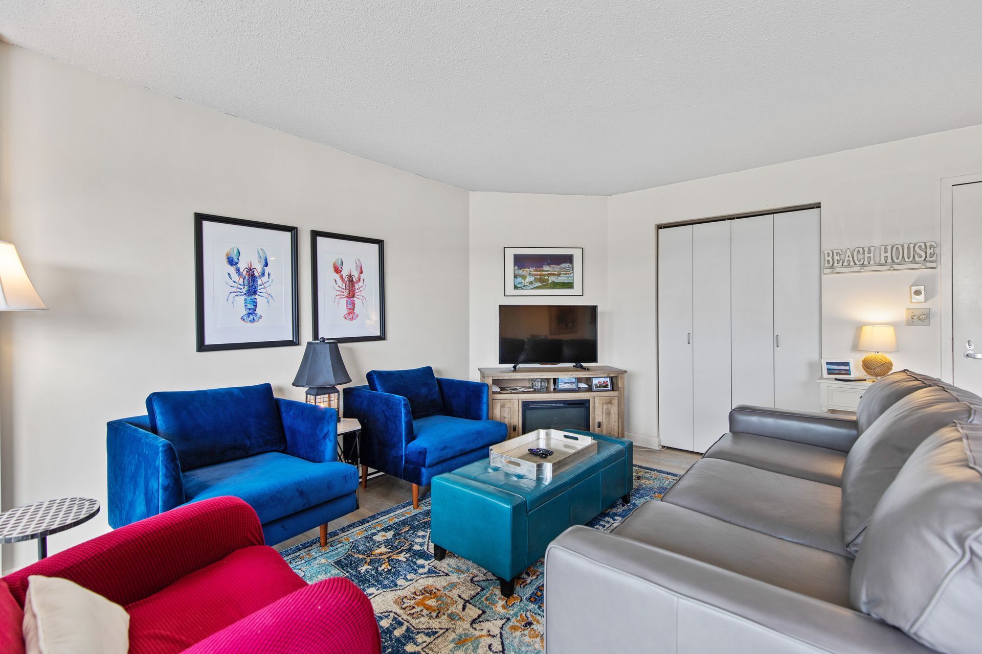A living room filled with furniture and a television.